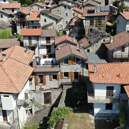 Nyaraló Rustico Casa Marie Mit Seeblick-dachterasse
