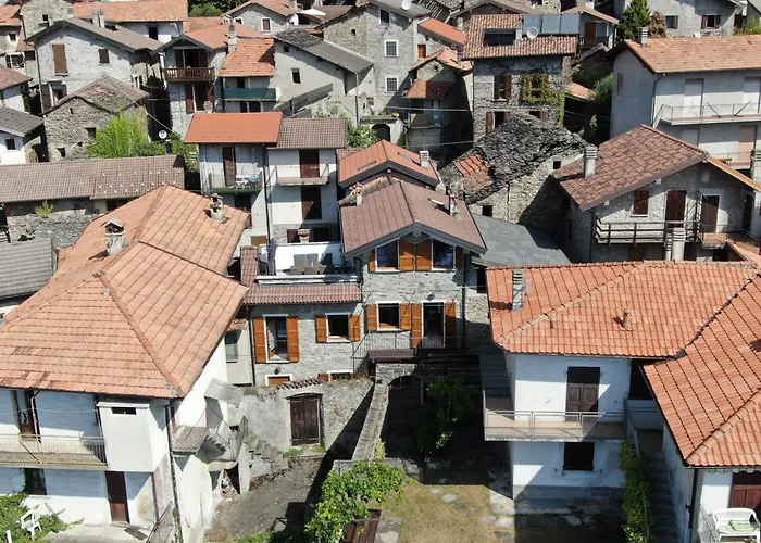 Nyaraló Rustico Casa Marie Mit Seeblick-dachterasse