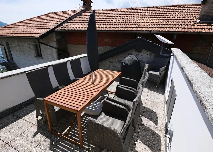 Nyaraló Rustico Casa Marie Mit Seeblick-dachterasse